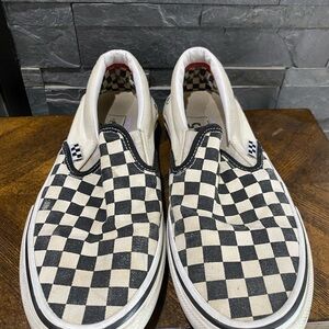 Vans Black and White Checkerboard Slip-On Sneakers